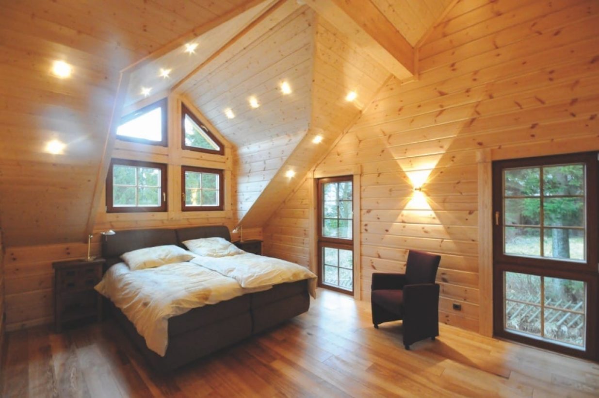 Bedroom in Honka log home Ivalo in St. Andreasberg, Germany.